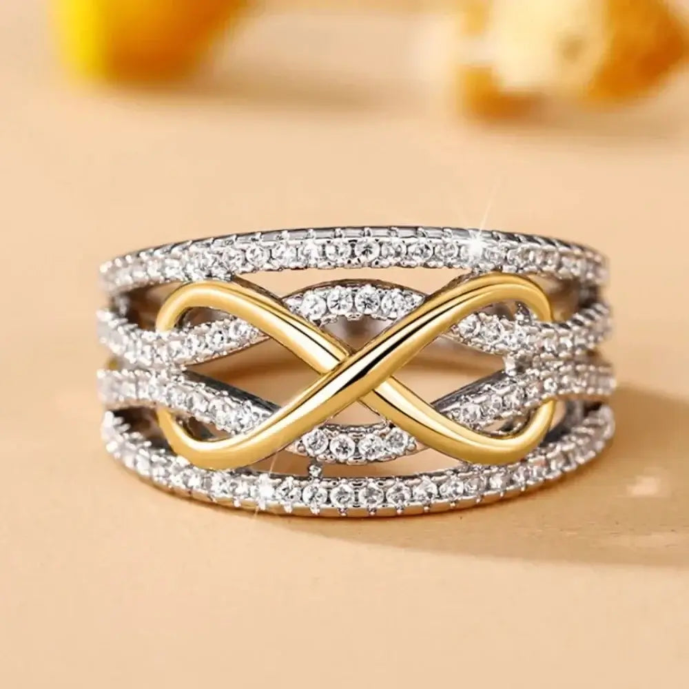 Anillo Infinito Bicolor con Zirconias Brillantes