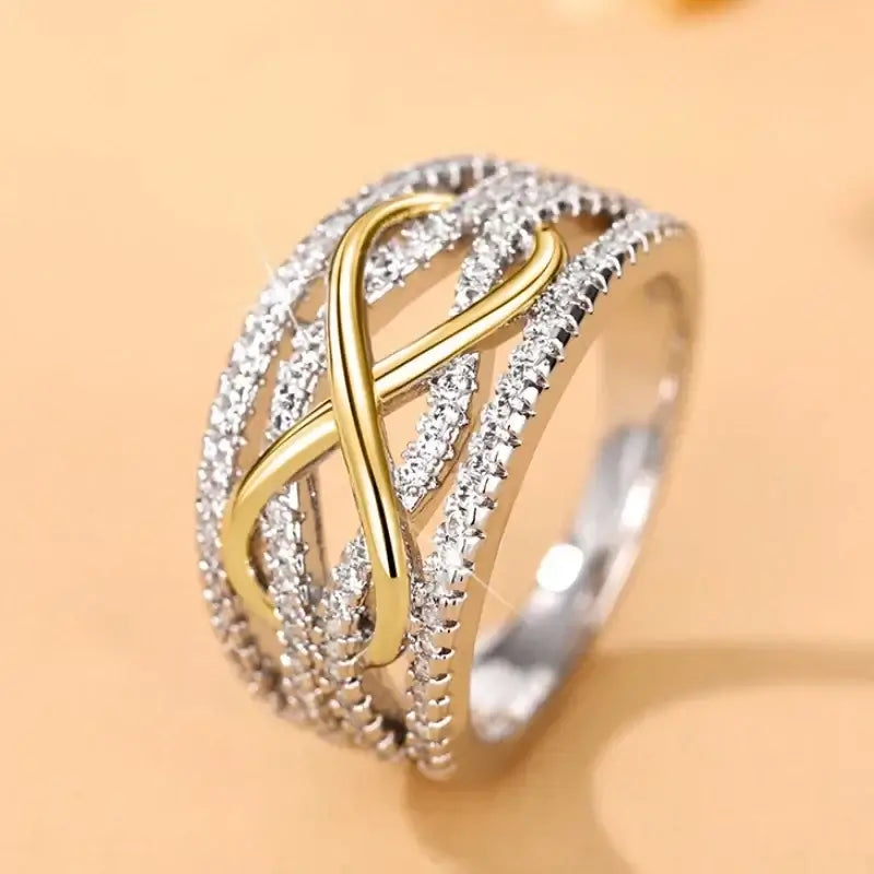 Anillo Infinito Bicolor con Zirconias Brillantes